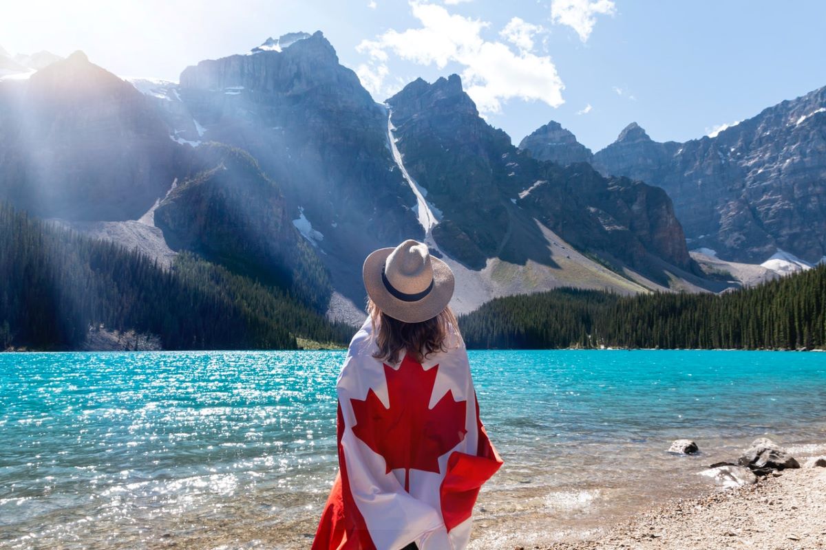 Woman wrapped in Canadian flag