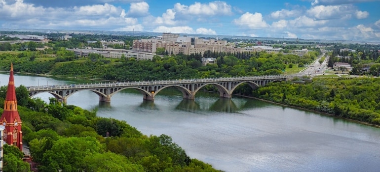 an aerial view of a bridge in Saskatoon, one of the largest cities in Saskatchewan