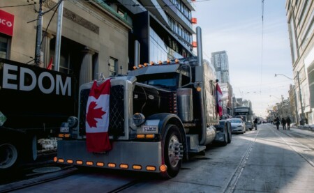 truck with a Canadian flag symbolising moving from Toronto to Richmond BC
