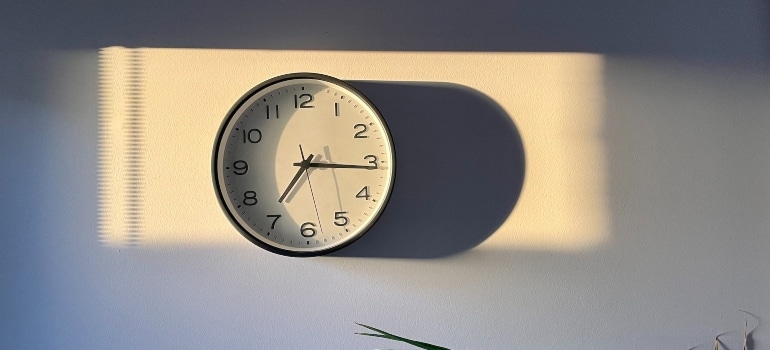 a clock on the white wall