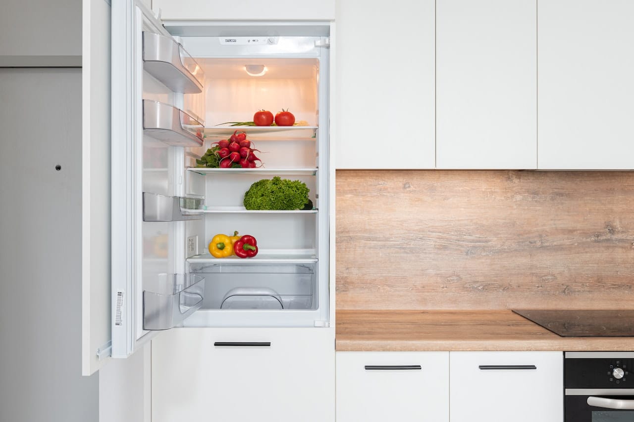 white refrigerator with open door