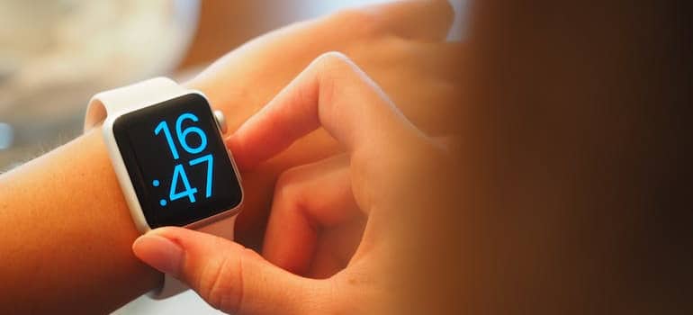 person looking at their smart watch