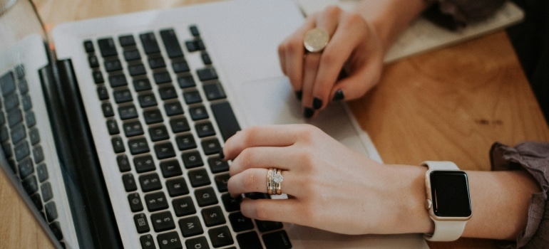 Person researching affordable living in Hamilton