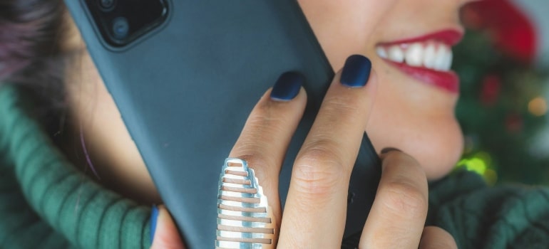 Person during a phone call smilling