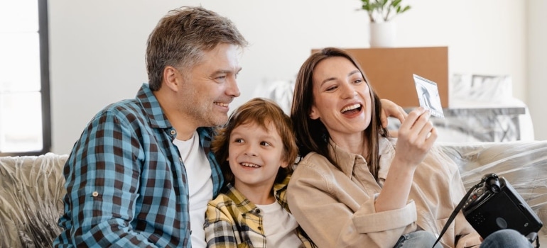 Happy family in their new home