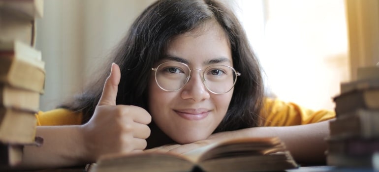 Person showing thumbs up